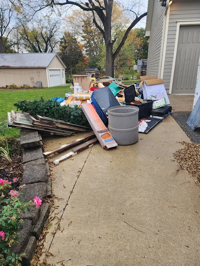 Dumpster being loaded with debris for 3 Yard Dumpster Rental in Walkersville
